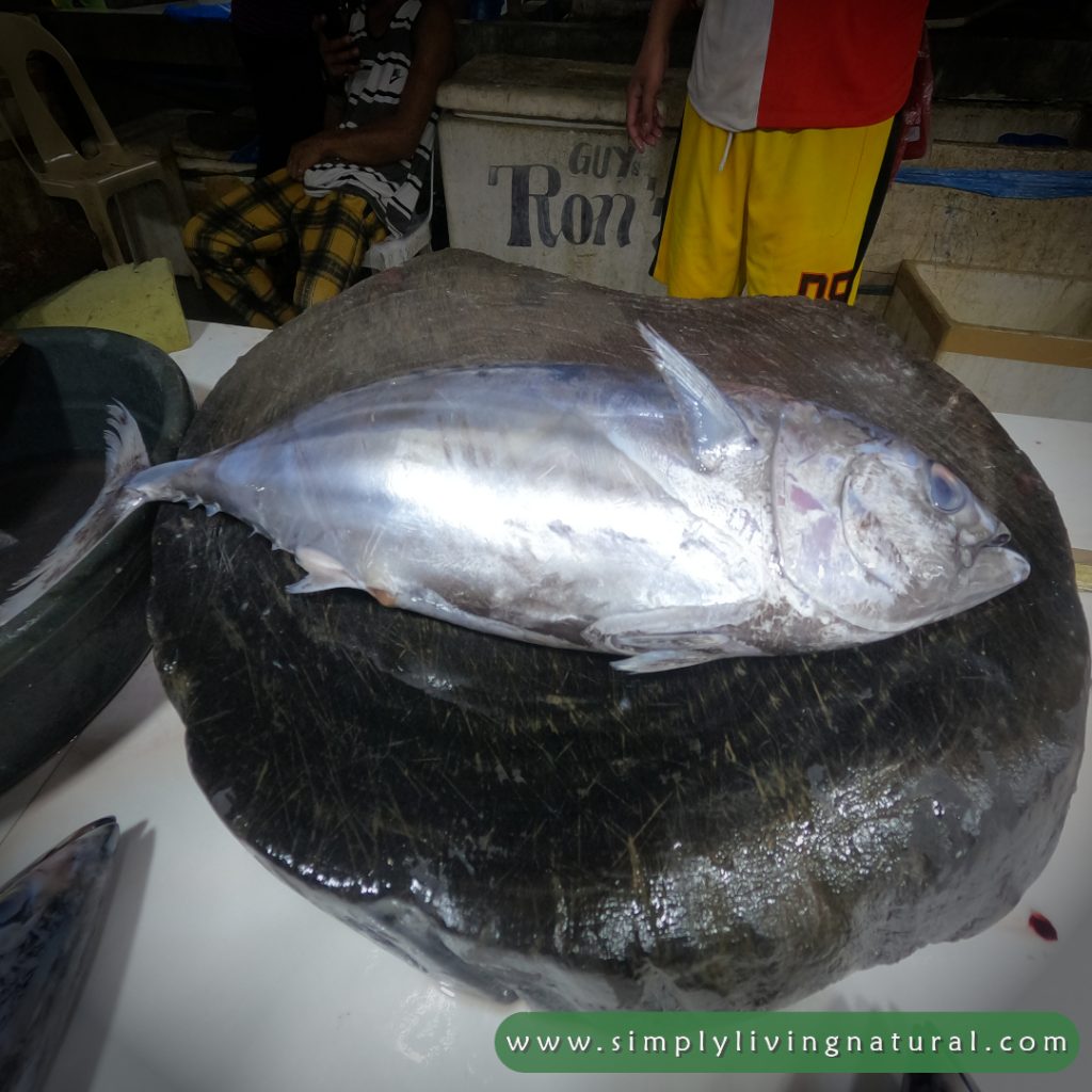 Large fish on a wooden board